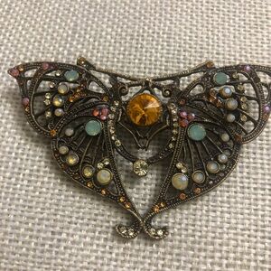 Elegant Butterfly Brooch with Multicolor stones.